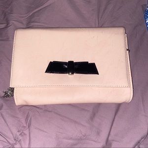 Light pink crossbody with black bow